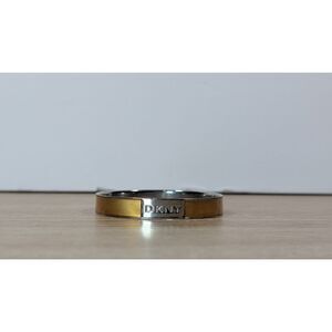 DKNY Gold & Silver Tone Bangle Bracelet Minimalist Logo Cuff Women's